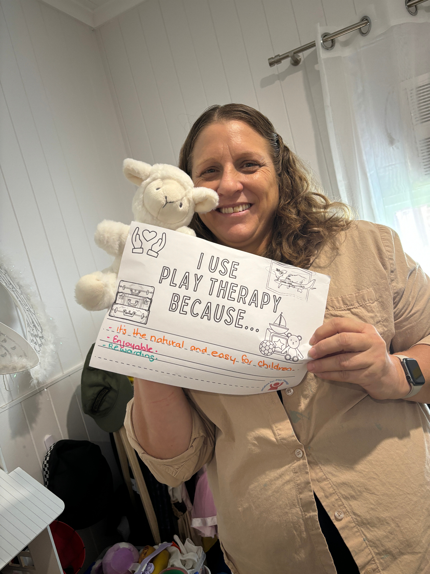 Clinician with play therapy materials